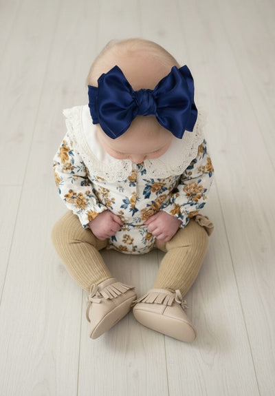 Baby navy satin bow headband – Baby Bling soft nylon boutique bow