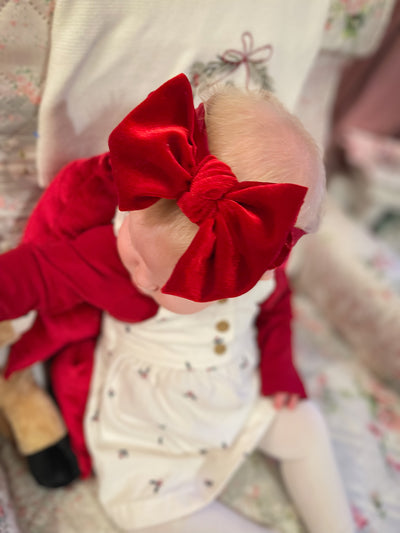 Baby ruby red velvet bow headband – Baby Bling soft nylon holiday accessory